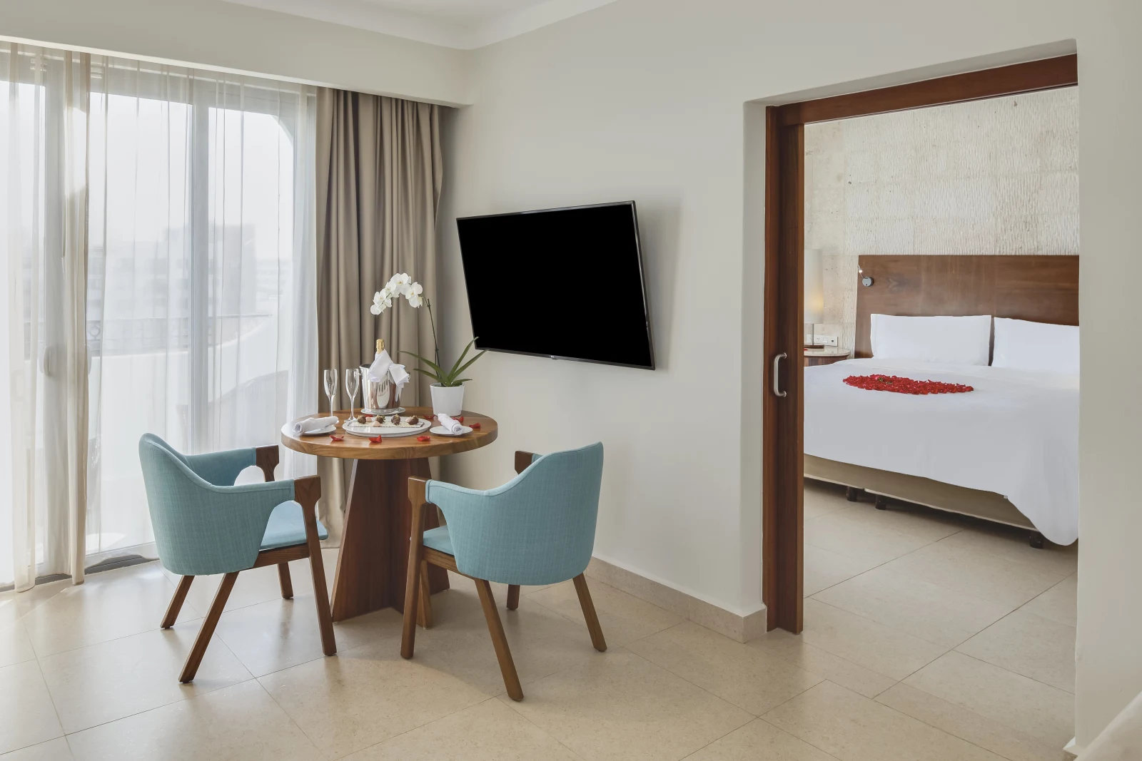 Honeymoon suite living area and bedroom at Fiesta Americana Condesa Cancún