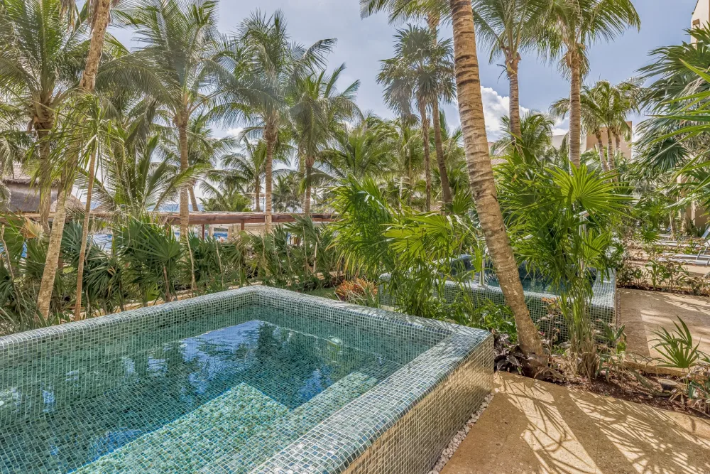 Private garden plunge pool off a ground-floor room at Fiesta Americana Condesa Cancún