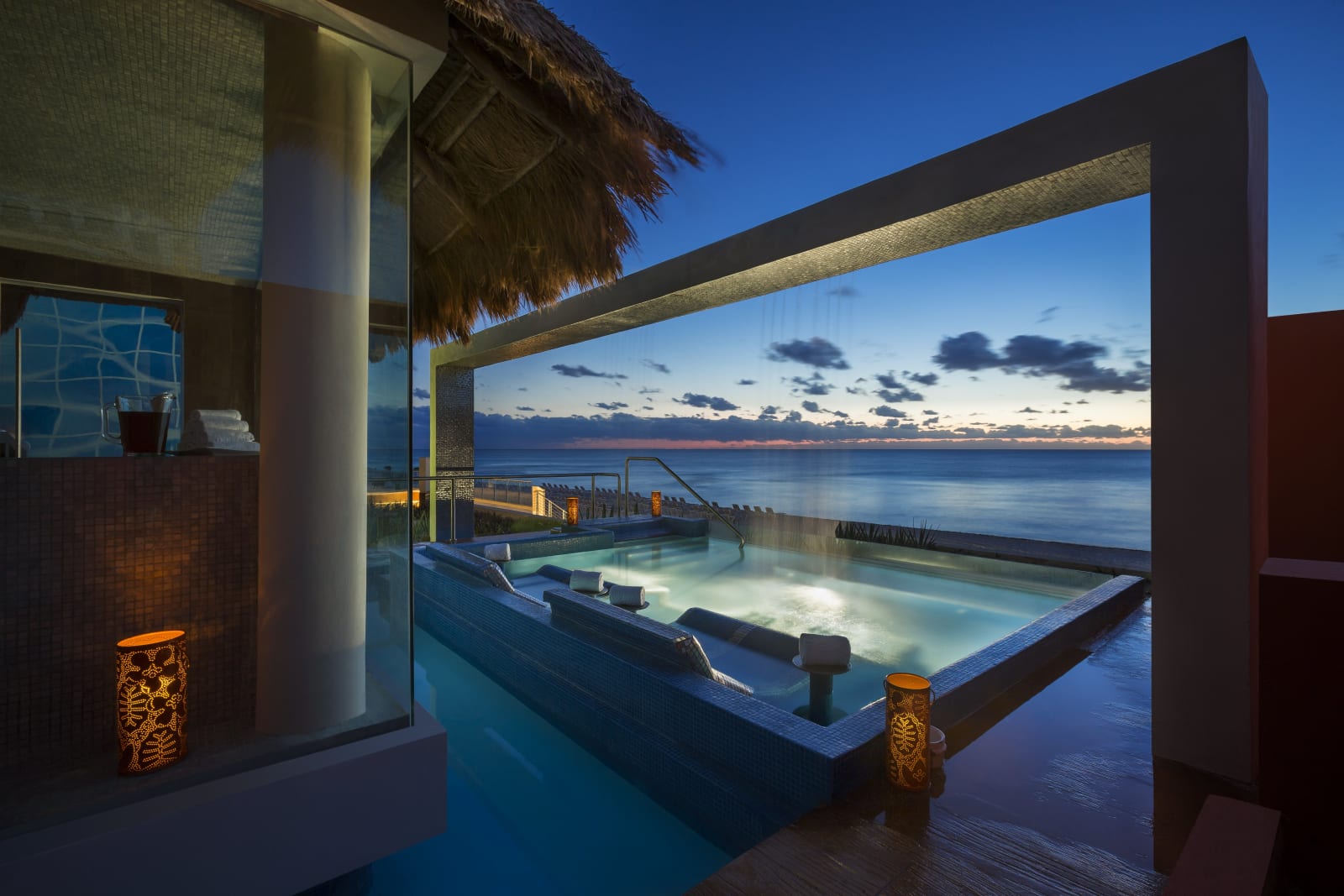 Oceanfront spa hydrotherapy plunge pool at dusk at Hard Rock Hotel Cancún